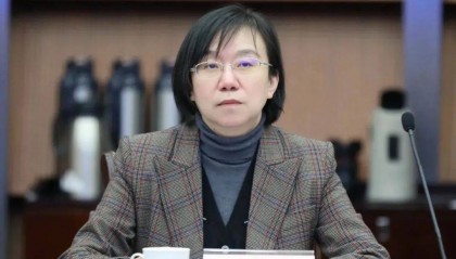 何月秀，被查